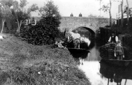 Peat being transported by boat in Westhay.
