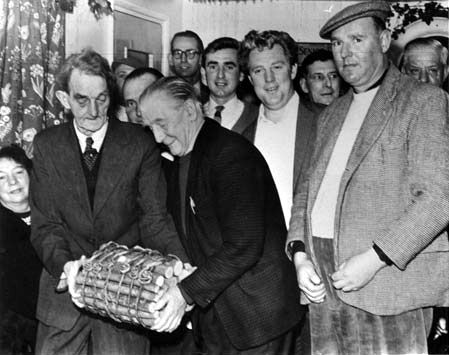 The Ashen Faggot being burnt at the King William IV pub in Curry Rivel in the 1960s. In Curry Rivel, a village near Langport, this particular Somerset custom survives today. 